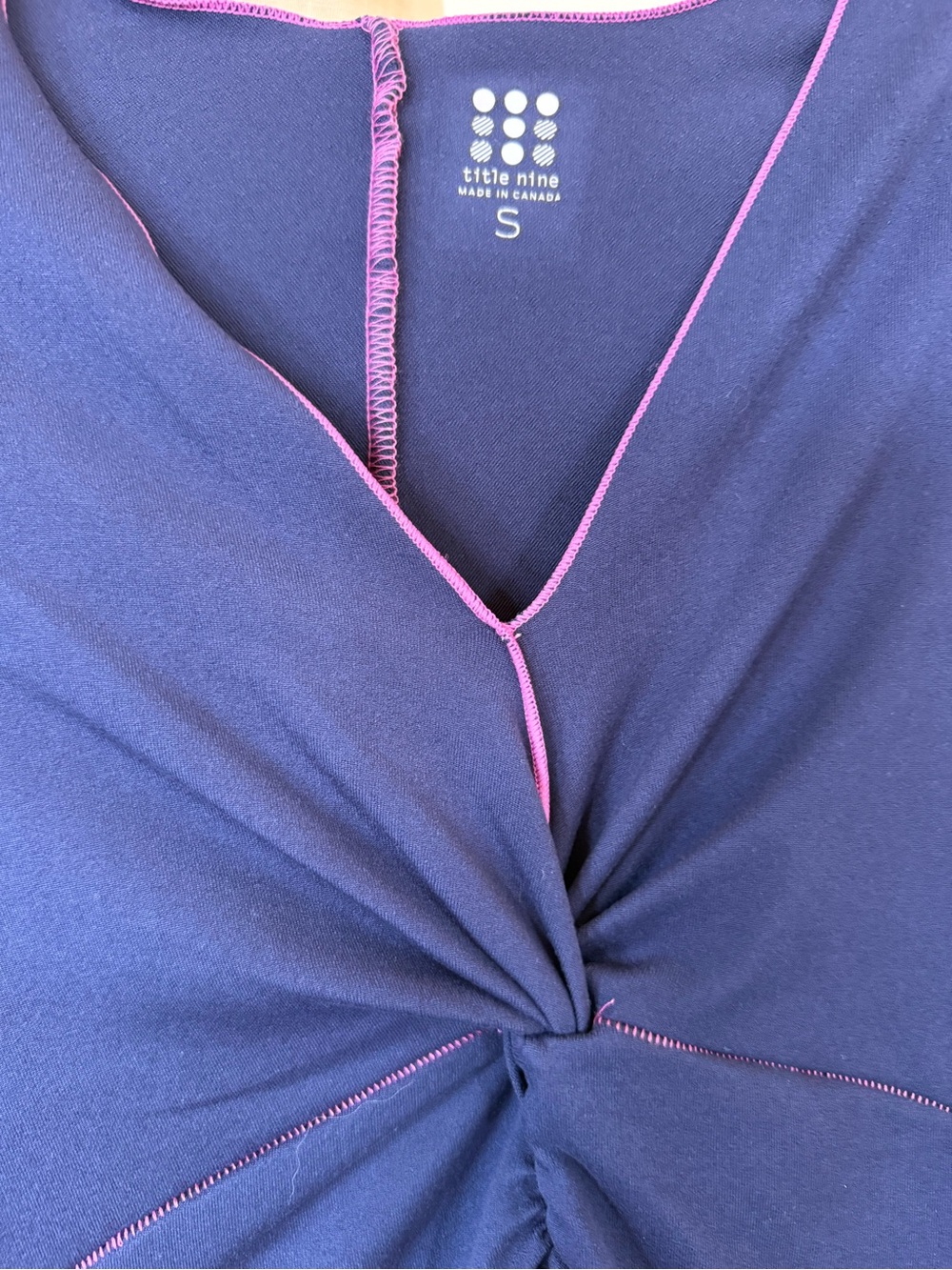 Title Nine Navy V-Neck Twist-Front Top with Pink Accent